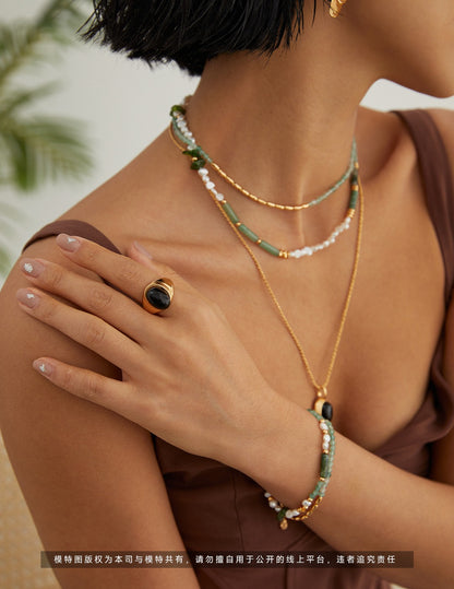 Sterling Silver Pearl Bracelet with Green Gemstones – Trendy & Unique